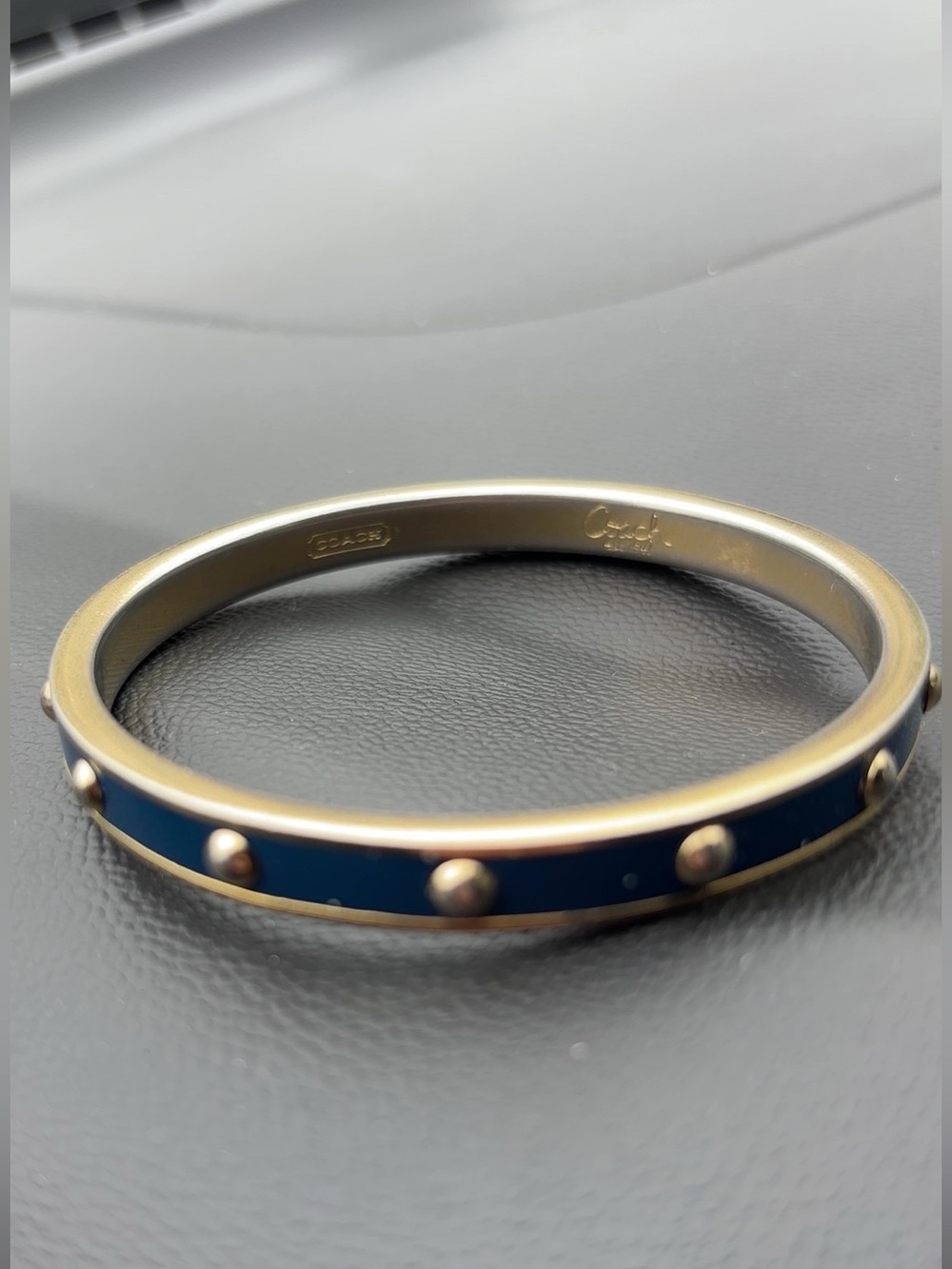 Coach Gold-Tone Bangle with Navy Enamel and Stud Accents